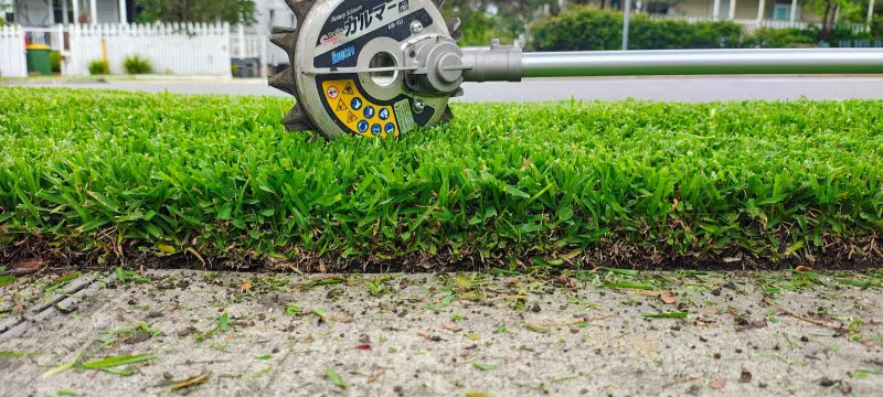 IDECH ASK-V23 rotary scissors edging Sir Walter Buffalo along the footpath